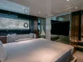 SEDICI Riva 66 Ribelle - master cabin bed and TV SEDICI Riva 66 Ribelle - master cabin bed and TV