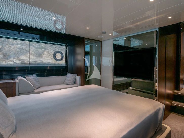 SEDICI Riva 66 Ribelle - master cabin bed and TV SEDICI Riva 66 Ribelle - master cabin bed and TV