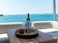 SEADUCTIVE ORCA Lagoon Sixty 5 - wine on the flybridge SEADUCTIVE ORCA Lagoon Sixty 5 - wine on the flybridge