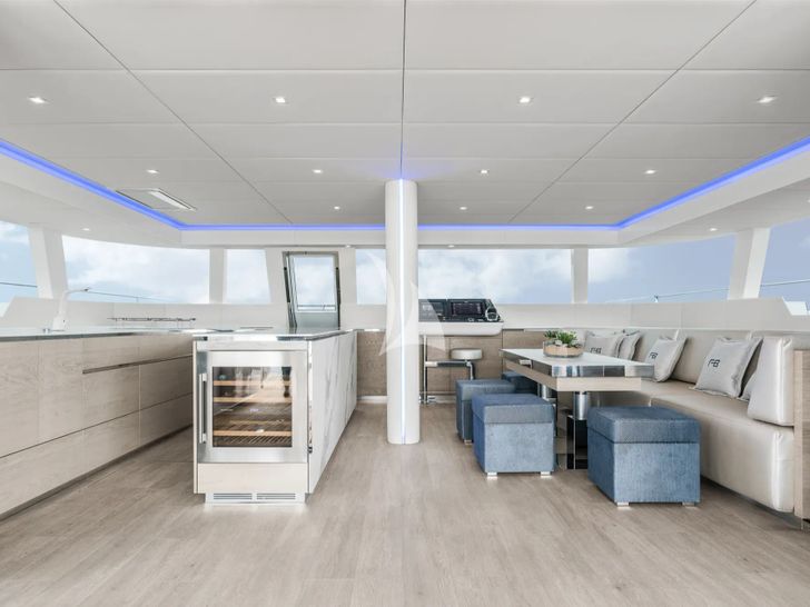 SERENITY Sunreef 60 - dining area and galley SERENITY Sunreef 60 - dining area and galley