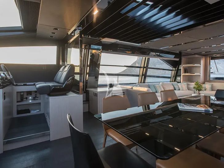 SPACE COWBOY Riva 88 Folgore - dining area and cockpit SPACE COWBOY Riva 88 Folgore - dining area and cockpit