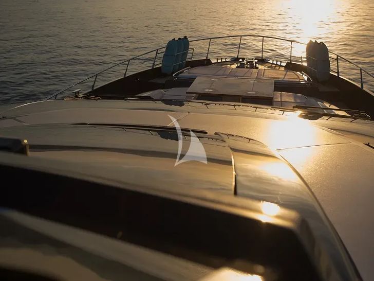 SPACE COWBOY Riva 88 Folgore - foredeck under the sunset SPACE COWBOY Riva 88 Folgore - foredeck under the sunset