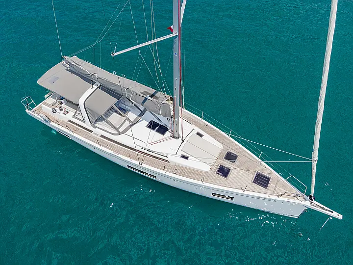 SPRING SONG Oceanis 54 - anchored aerial shot
