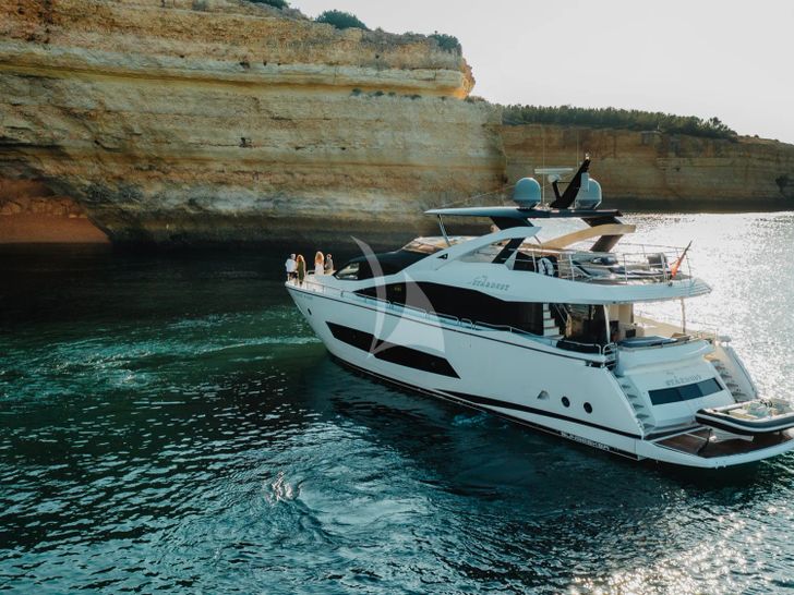STARDUST OF MARY Sunseeker 86 - anchored near a cliff STARDUST OF MARY Sunseeker 86 - anchored near a cliff