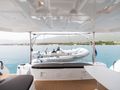 SUMMER MAGIC Lagoon 46F - aft deck with the tender SUMMER MAGIC Lagoon 46F - aft deck with the tender
