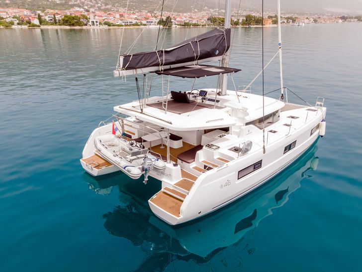 SUMMER MAGIC Lagoon 46F - anchored aft shot SUMMER MAGIC Lagoon 46F - anchored aft shot
