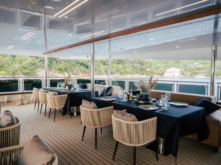 SYMPHONY Custom Yacht 52m - alfresco dining set up SYMPHONY Custom Yacht 52m - alfresco dining set up