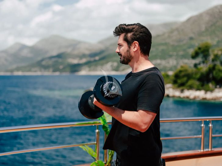 SYMPHONY Custom Yacht 52m - guest working out SYMPHONY Custom Yacht 52m - guest working out