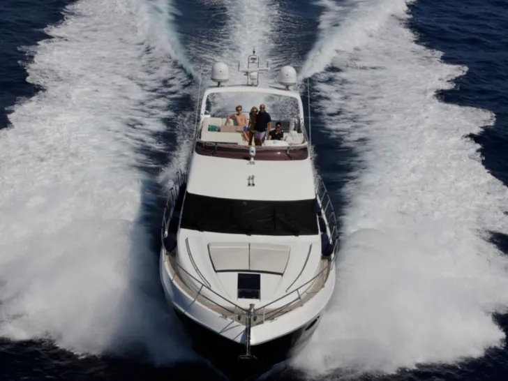 Princess 64 Fly Blue - cruising bow view Princess 64 Fly Blue - cruising bow view