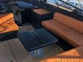 Van Dutch 40 - upper deck seating with a table Van Dutch 40 - upper deck seating with a table