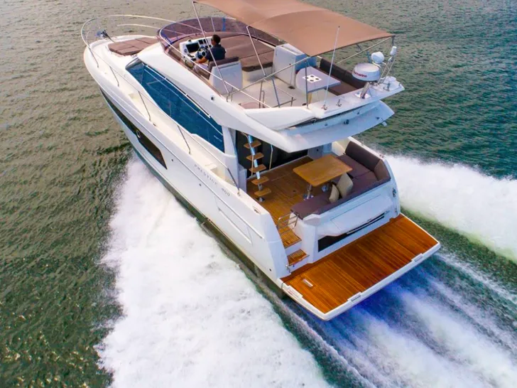 Prestige 460 Fly - cruising aft shot Prestige 460 Fly - cruising aft shot