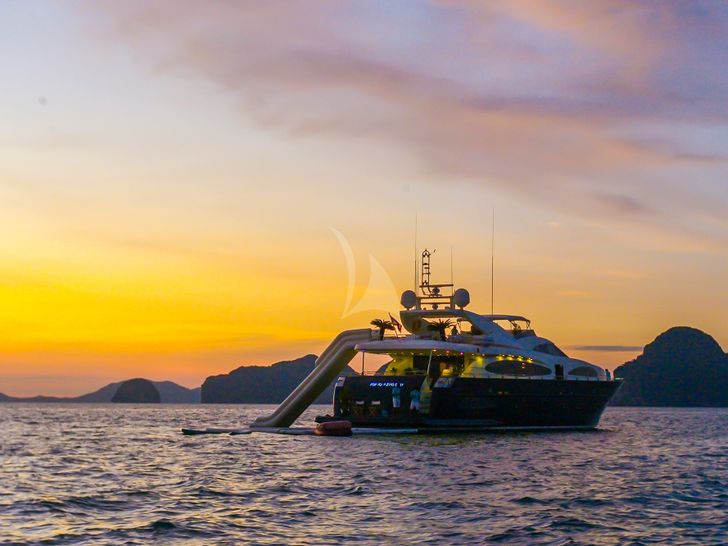 FOR YOUR EYES ONLY Astondoa 102 GLX - acnhored under the sunset with the water slide set up FOR YOUR EYES ONLY Astondoa 102 GLX - acnhored under the sunset with the water slide set up