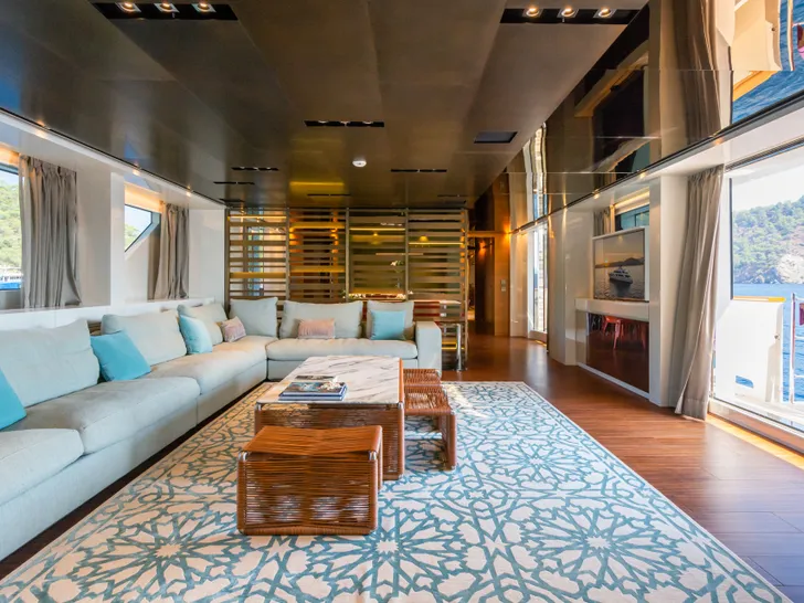 TAKARA ONE Sanlorenzo SD126 - main saloon couch and balcony TAKARA ONE Sanlorenzo SD126 - main saloon couch and balcony