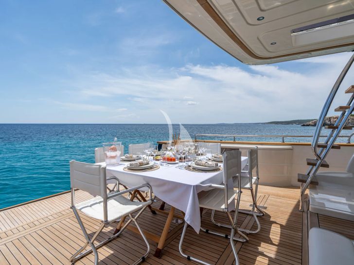 TRABUCAIRE Apreamare 66 - aft deck dining set up TRABUCAIRE Apreamare 66 - aft deck dining set up