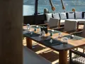VELA Phinisi 50m - aft deck alfresco dining table VELA Phinisi 50m - aft deck alfresco dining table