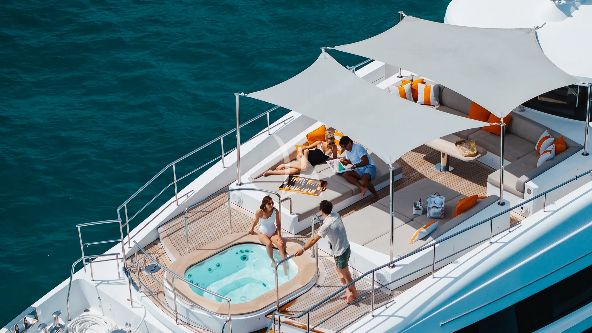 WABASH Benetti Classic Supreme 132 - guests on the foredeck jacuzzi