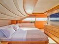WATCH ME Ferretti Custom Line 30m - master cabin bed and TV WATCH ME Ferretti Custom Line 30m - master cabin bed and TV