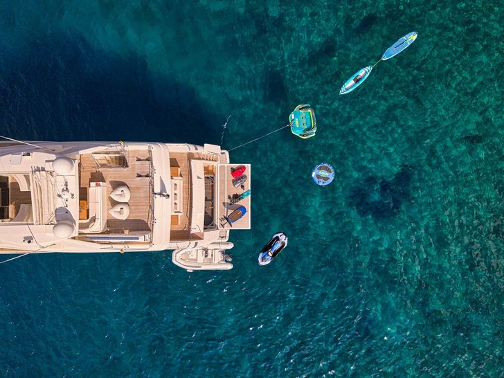 WATCH ME Ferretti Custom Line 30m - top aft shot with the water toys WATCH ME Ferretti Custom Line 30m - top aft shot with the water toys