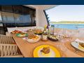WATERMACHINE - Gulf Craft Majesty 100,aft deck dining set up