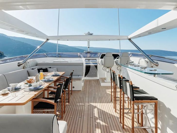 WICKED PLAY Sunseeker 115 Sport Yacht - sun deck dining and bar area WICKED PLAY Sunseeker 115 Sport Yacht - sun deck dining and bar area