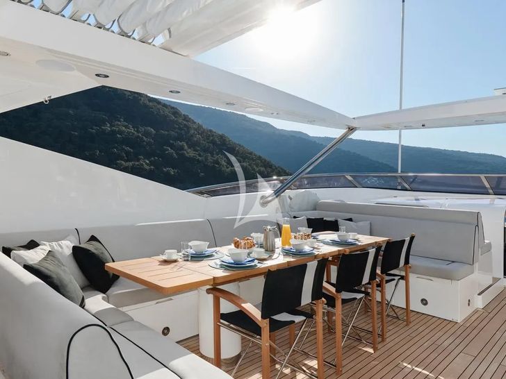 WICKED PLAY Sunseeker 115 Sport Yacht - sun deck dining area WICKED PLAY Sunseeker 115 Sport Yacht - sun deck dining area