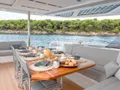 WINDKIND Fountaine Pajot Thira 80 - aft deck alfresco dining set up WINDKIND Fountaine Pajot Thira 80 - aft deck alfresco dining set up