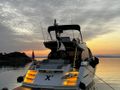 X2 Sunseeker 65 Sport - docked aft shot under the sunset X2 Sunseeker 65 Sport - docked aft shot under the sunset