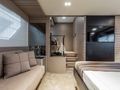 YAMAS Ferretti 670 master cabin seating area and TV