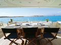 YOLO TOO Ferretti Custom Line 94 - aft deck dining area YOLO TOO Ferretti Custom Line 94 - aft deck dining area