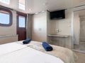 YOLO Odisej 48m - master cabin bed and TV YOLO Odisej 48m - master cabin bed and TV