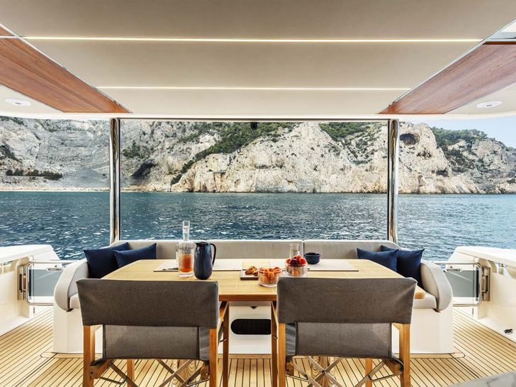 LEGEND II Absolute Navetta 68 - aft deck dining area LEGEND II Absolute Navetta 68 - aft deck dining area