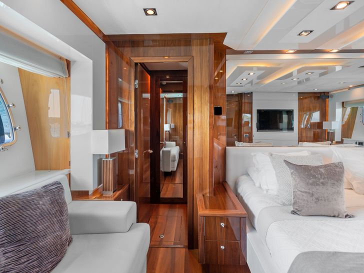 PALUMBA Sunseeker Predator 84 - master cabin bed and seating area PALUMBA Sunseeker Predator 84 - master cabin bed and seating area