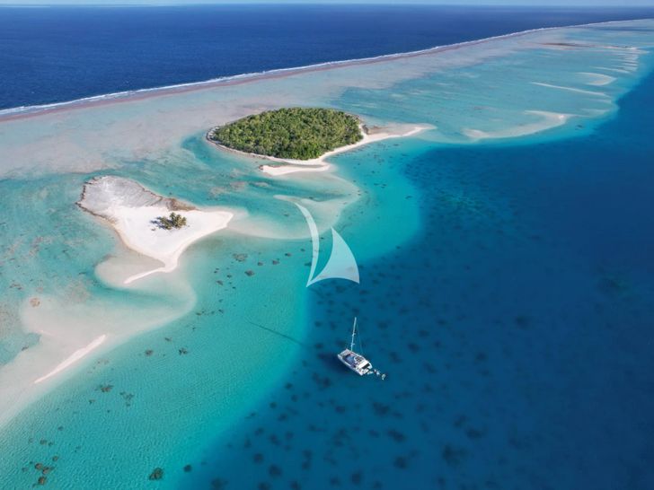 ZEN QUEST Lagoon 620 - drone shot anchored near an island ZEN QUEST Lagoon 620 - drone shot anchored near an island