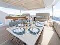 ZOZO Azimut Grande 27m - sundeck alfresco dining set up ZOZO Azimut Grande 27m - sundeck alfresco dining set up