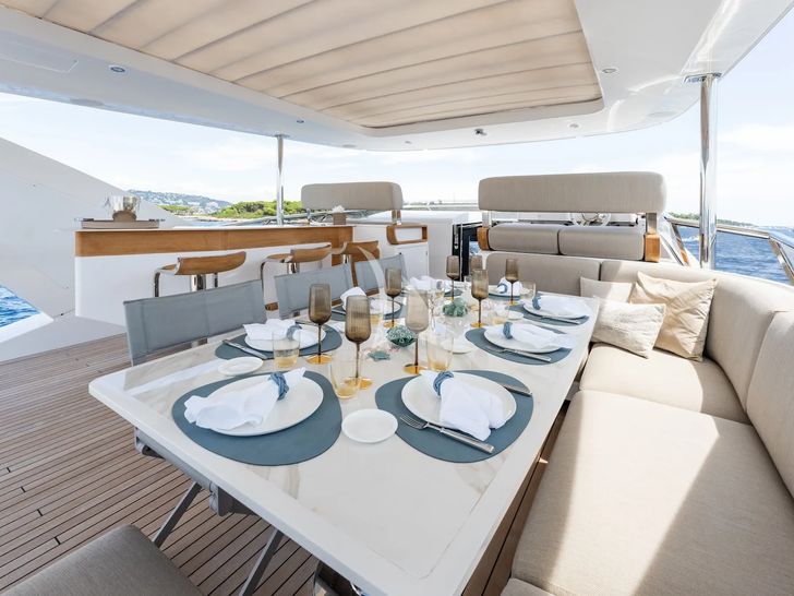 ZOZO Azimut Grande 27m - sundeck alfresco dining set up ZOZO Azimut Grande 27m - sundeck alfresco dining set up
