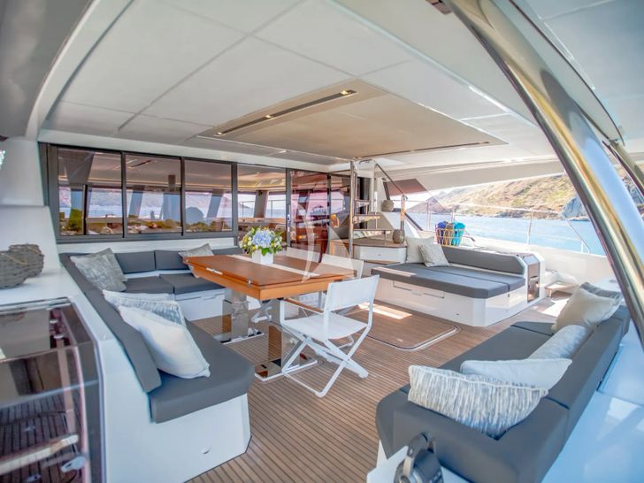 CORE Fountaine Pajot Power 67 - aft deck lounge and dining area CORE Fountaine Pajot Power 67 - aft deck lounge and dining area