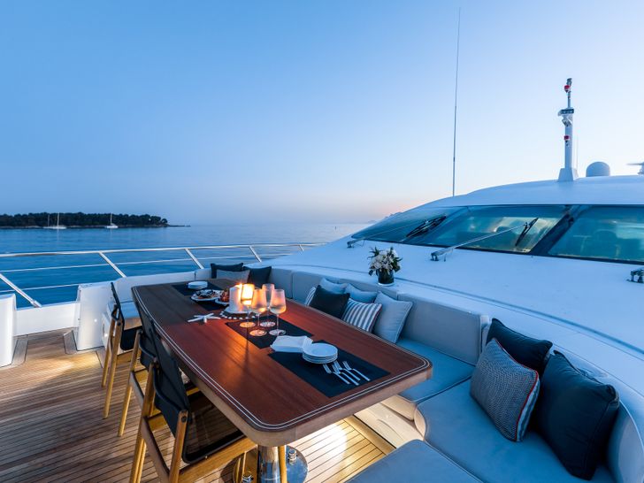 BEACHOUSE Mangusta 130 foredeck at night BEACHOUSE Mangusta 130 foredeck at night