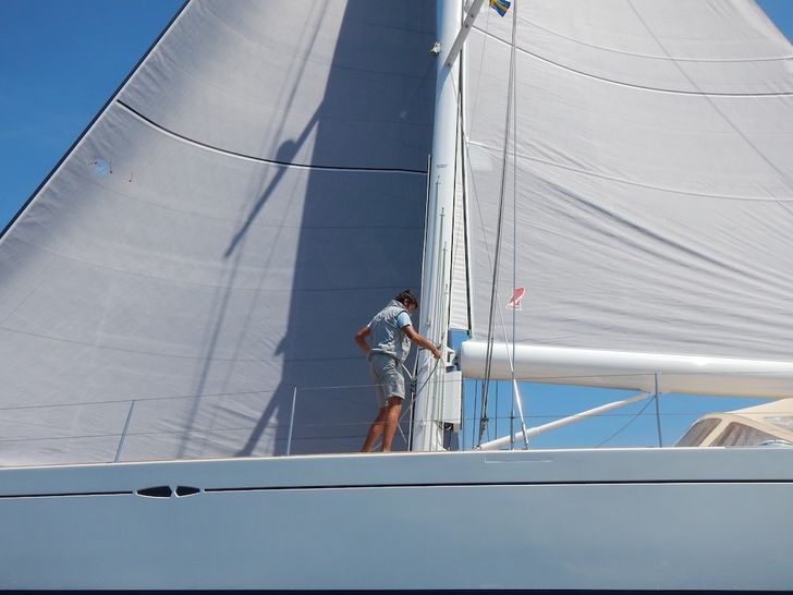 ELINE - X-Yacht X65,captain manning the sail