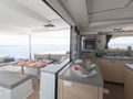 Fountaine Pajot Saona 47 - aft deck dining area and galley Fountaine Pajot Saona 47 - aft deck dining area and galley