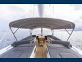 JIKAN - Advanced Yachts A80,sundeck seating lounge with the Bimini up