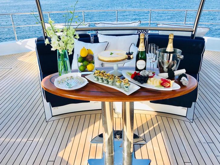 LADY AZUL Heesen 129 - wine on deck LADY AZUL Heesen 129 - wine on deck