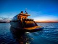 NEA MONI Cayman 75 Luxury Yacht Evening Lights NEA MONI Cayman 75 Luxury Yacht Evening Lights