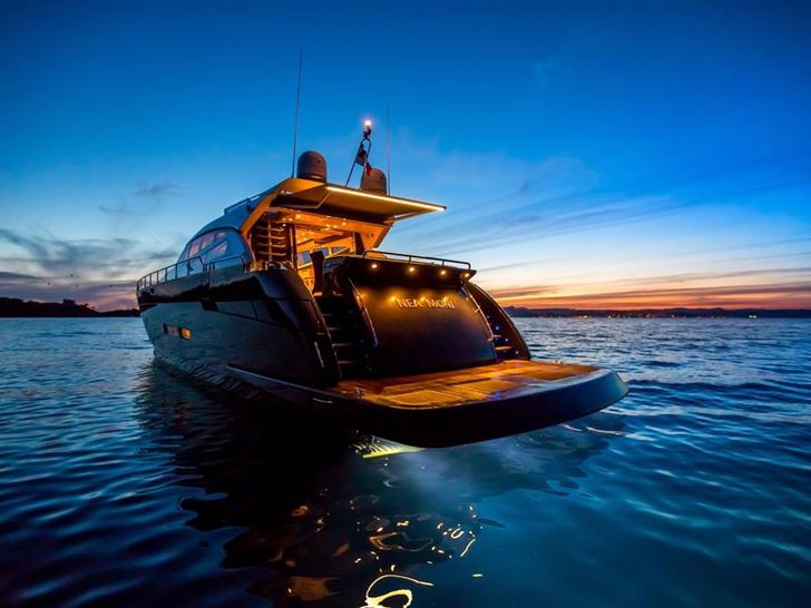 NEA MONI Cayman 75 Luxury Yacht Evening Lights NEA MONI Cayman 75 Luxury Yacht Evening Lights