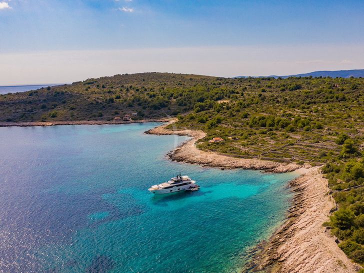 NOOR Sanlorenzo 102 - anchored near an island NOOR Sanlorenzo 102 - anchored near an island