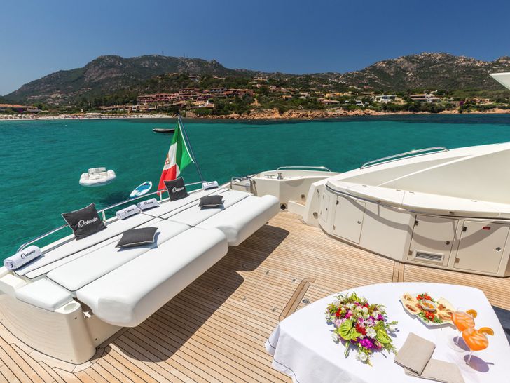 OCTAVIA Sunseeker Predator 82 - aft deck seating and dining area OCTAVIA Sunseeker Predator 82 - aft deck seating and dining area