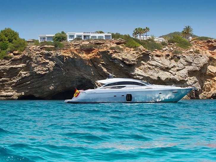 LEGENDARY Pershing 72 - anchored near an island LEGENDARY Pershing 72 - anchored near an island