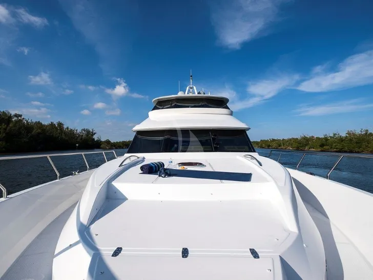 Crewed Motor Yacht Bow Sunbathing Crewed Motor Yacht Bow Sunbathing