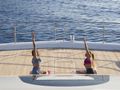 CRAZY HORSE Lagoon 78 - yoga session on the foredeck CRAZY HORSE Lagoon 78 - yoga session on the foredeck
