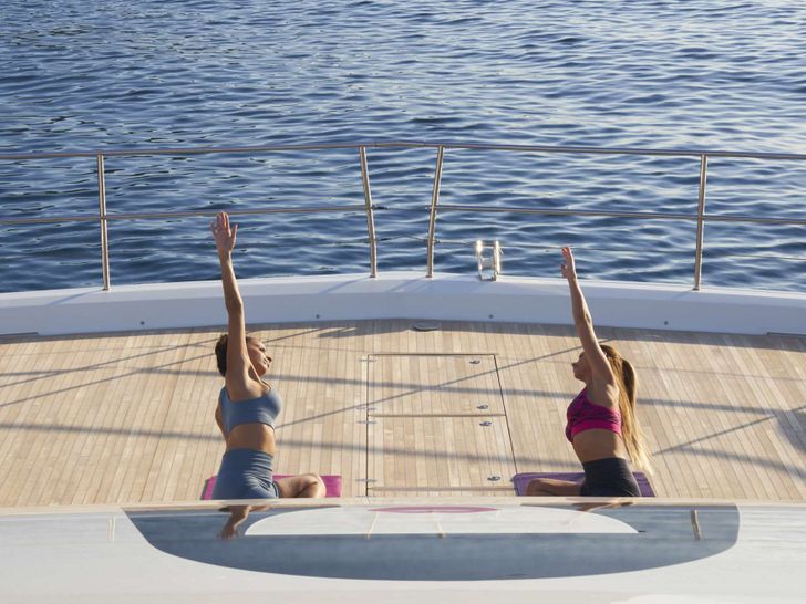 CRAZY HORSE Lagoon 78 - yoga session on the foredeck CRAZY HORSE Lagoon 78 - yoga session on the foredeck