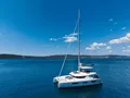 CHAMPAGNE PLEASE Lagoon 55 - anchored amidst the blue Croatian water CHAMPAGNE PLEASE Lagoon 55 - anchored amidst the blue Croatian water